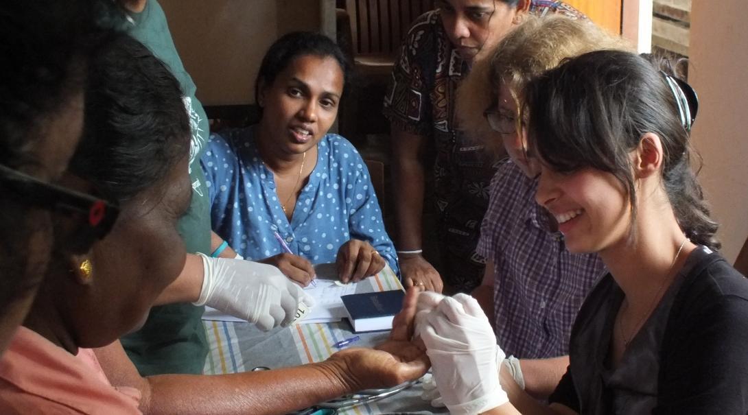 A female intern from projects abroad helping patients at a medical camp whilst gaining work experience on her public health internship in Sri Lanka. A female intern is pictured helping patients at a medical camp whilst she completes her public health internship in Sri Lanka with Projects Abroad.